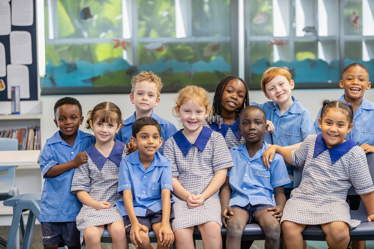 A group of ten students posing for the camera